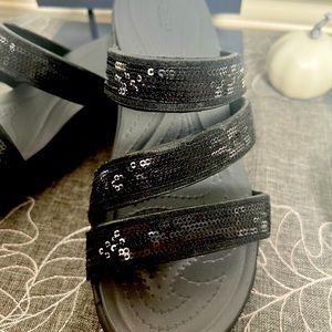 Women’s Crocs Lite ride, black sequin strap sandal.